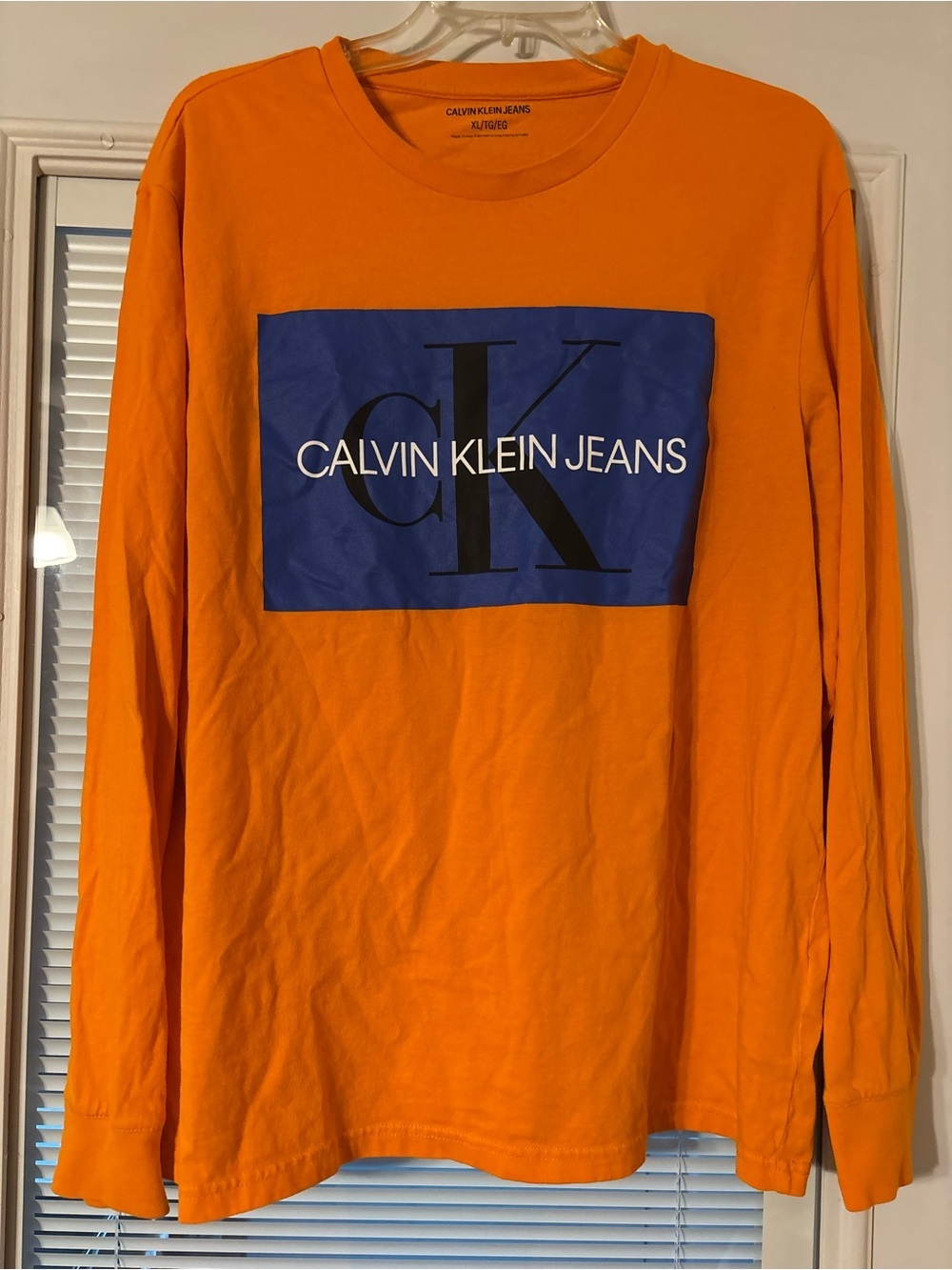 Calvin Klein Jeans Orange Long Sleeve Tee with Blue Logo Block